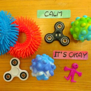 photo of spinners, push pop balls, silicone bracelets.